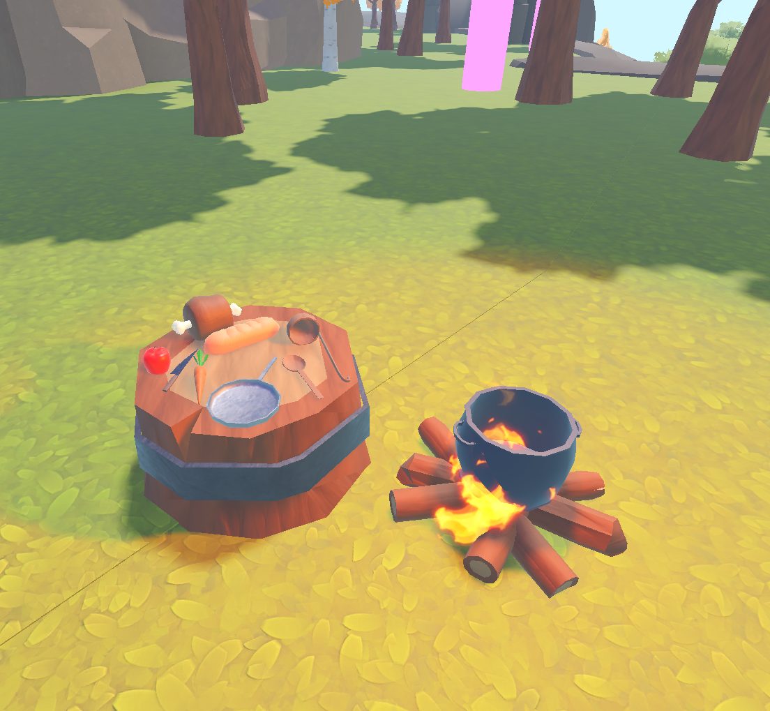 Cooking station and campfire in woodland